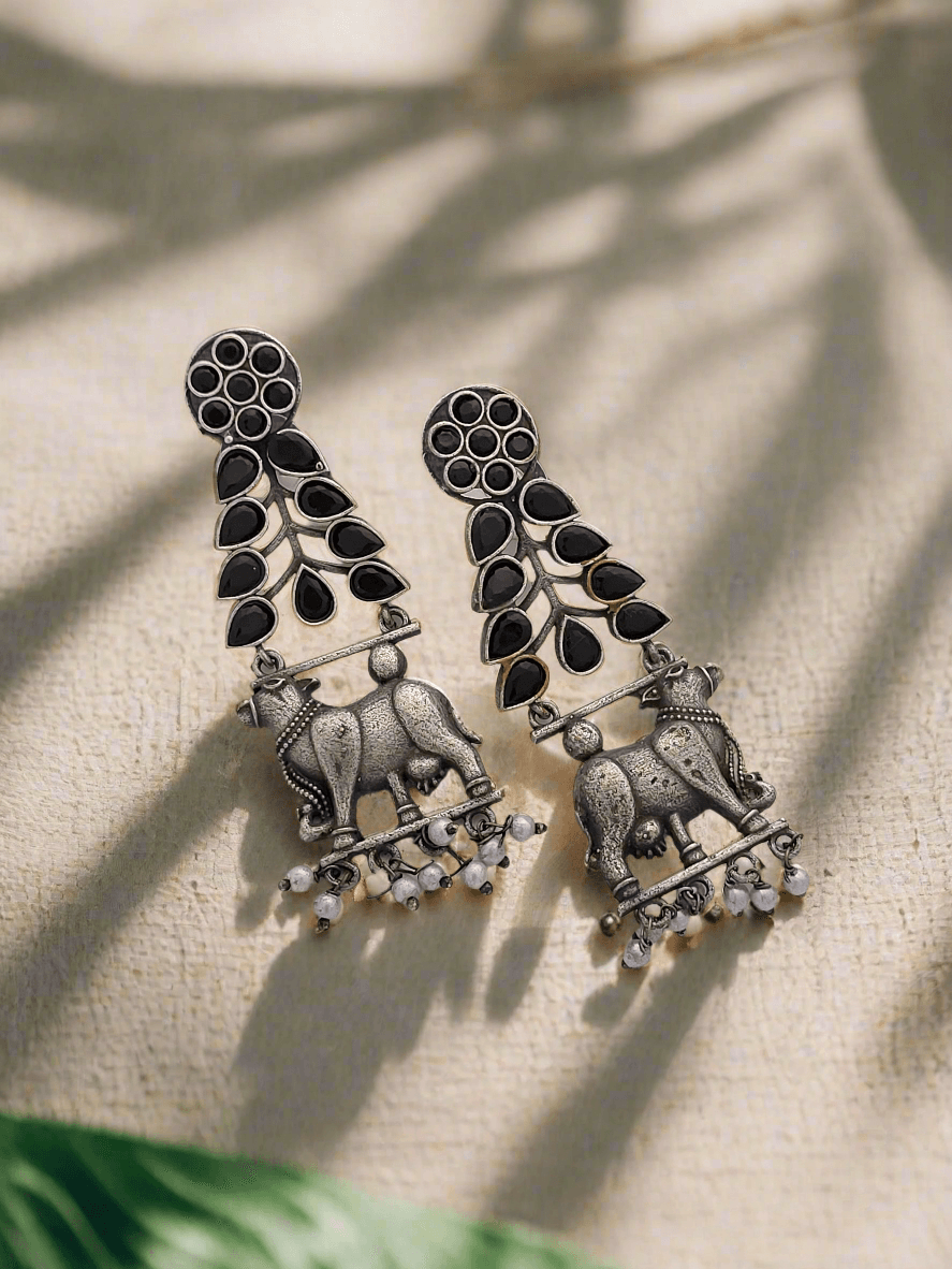 Oxidized cow & leaf dangle earrings - Mirae
