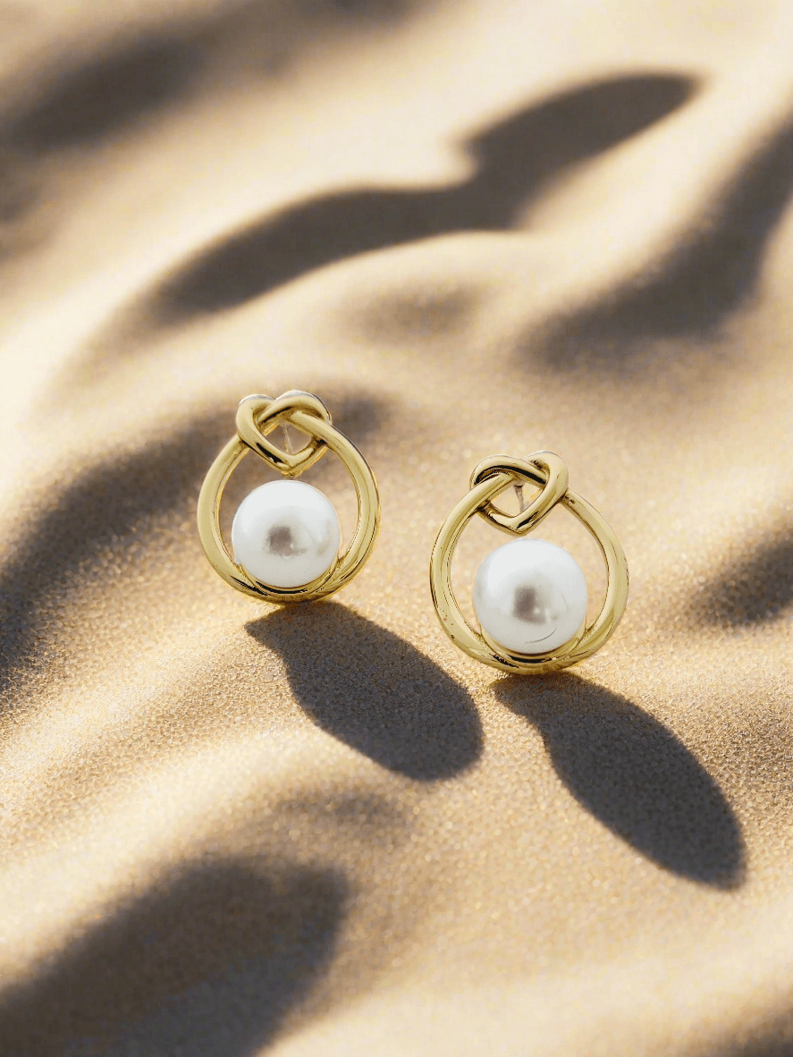 Elegant & Midern anti tarnish gold plated Heart knot studs - Mirae 